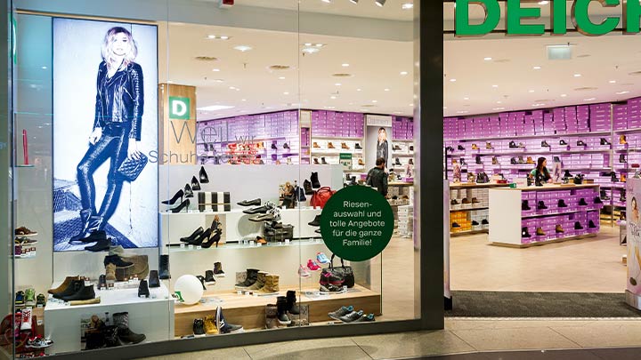 A bright shop window draws customers into the store